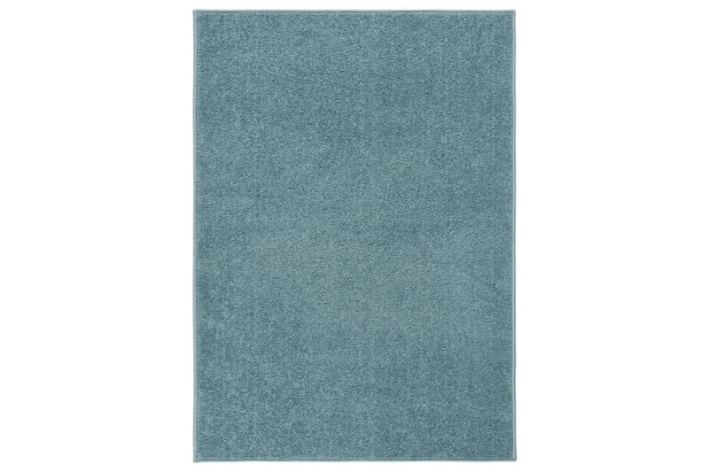 Teppe med kort luv 140x200 cm blå - Blå - Kjøkkenmatte - Gummiert tepper - Plastmatte balkong - Plasttepper - Små tepper - Mønstrede tepper - Store tepper - Hall matte - Balkongmatte - Håndvevde tepper